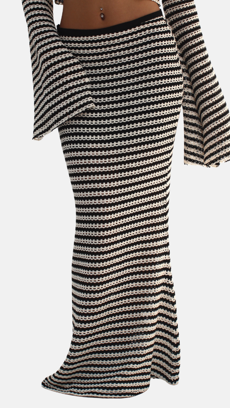 Black and white striped skirt on a white background