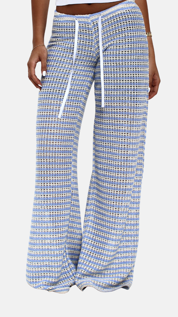 Blue and white checkered pants with a drawstring on a white background