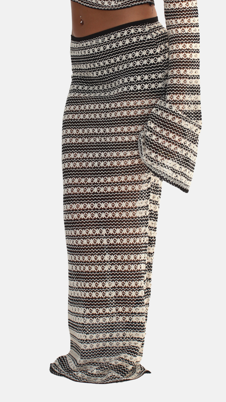 Black and white patterned pants on a white background